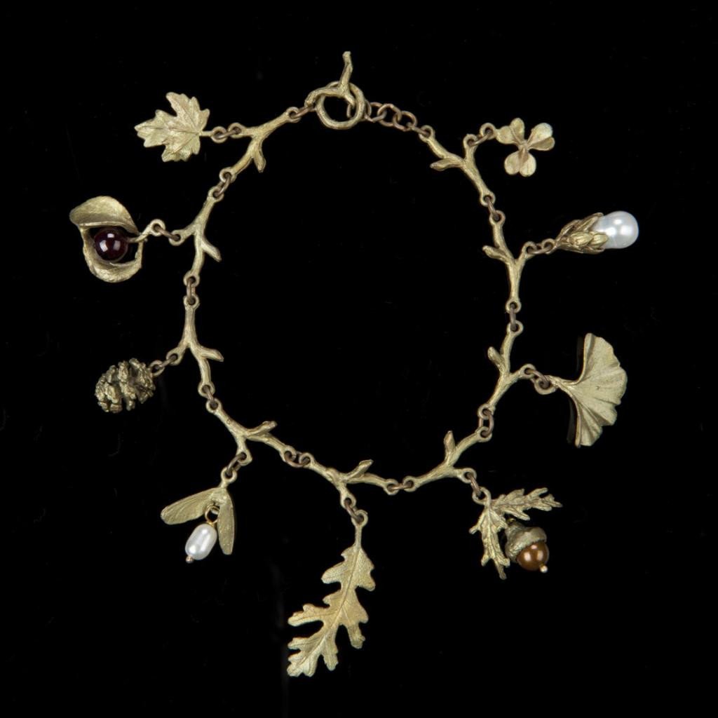 Image of the Michael Michaud Charm Bracelet on a black background