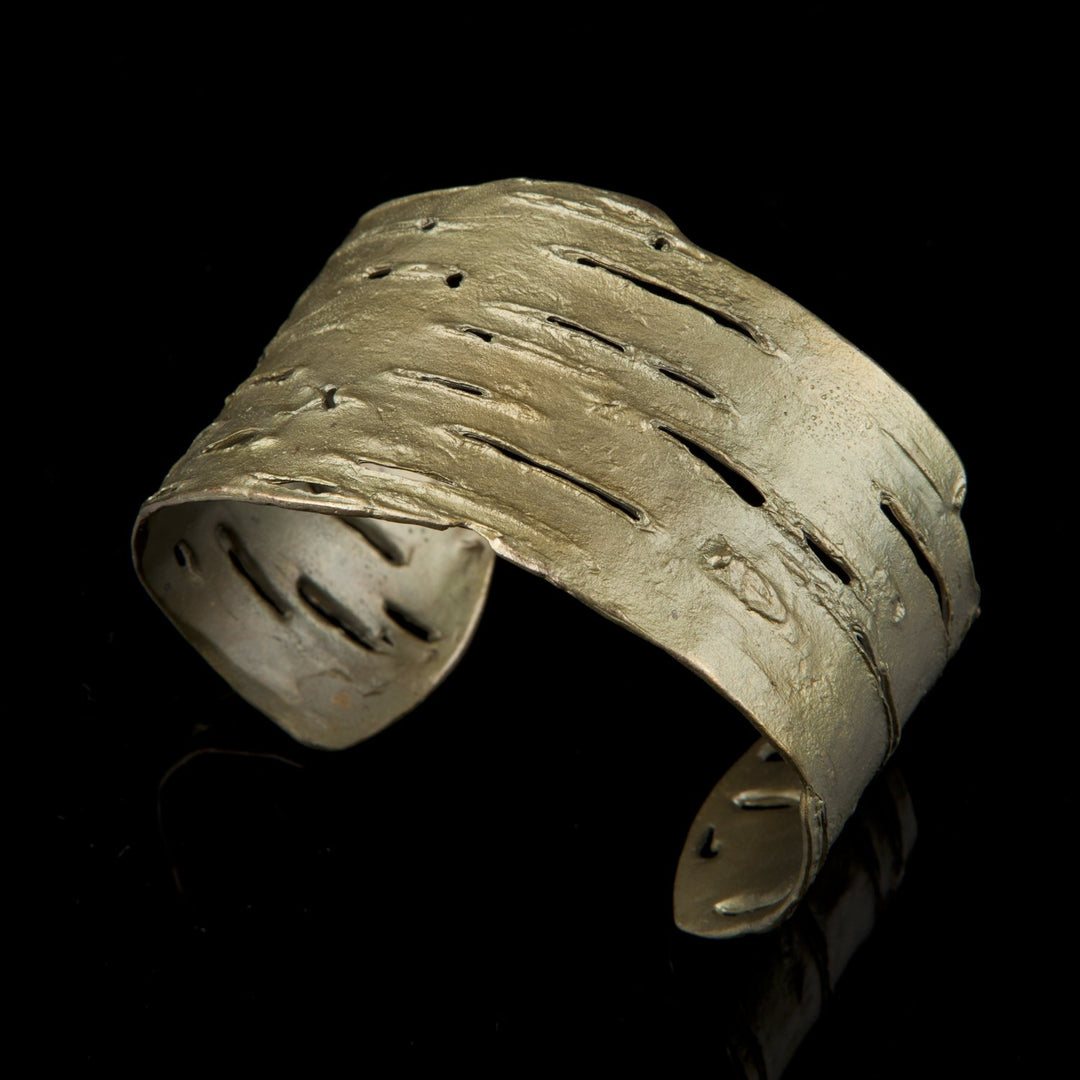 Image of the Michael Michaud Birch Bark Cuff - Green on a black background