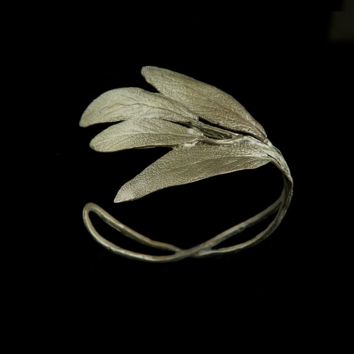 Image of the Michael Michaud Sage Cuff Bracelet on a black background