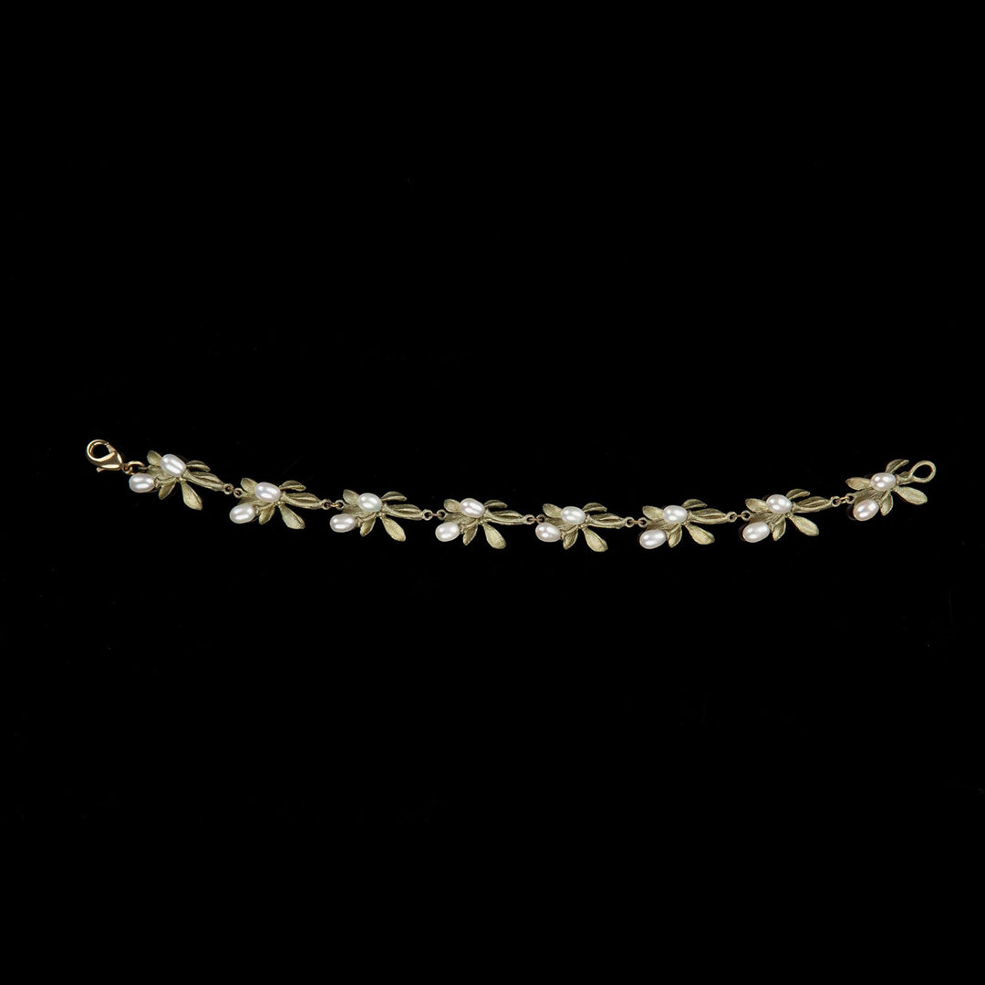 Image of the Michael Michaud Orange Blossom Bracelet on a black background