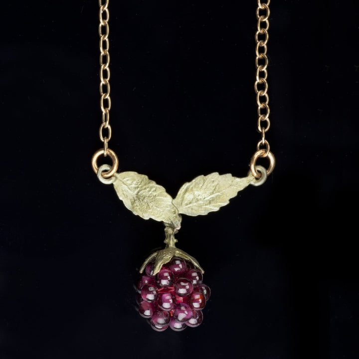Image of the Michael Michaud Raspberry Pendant - Chain on a black background