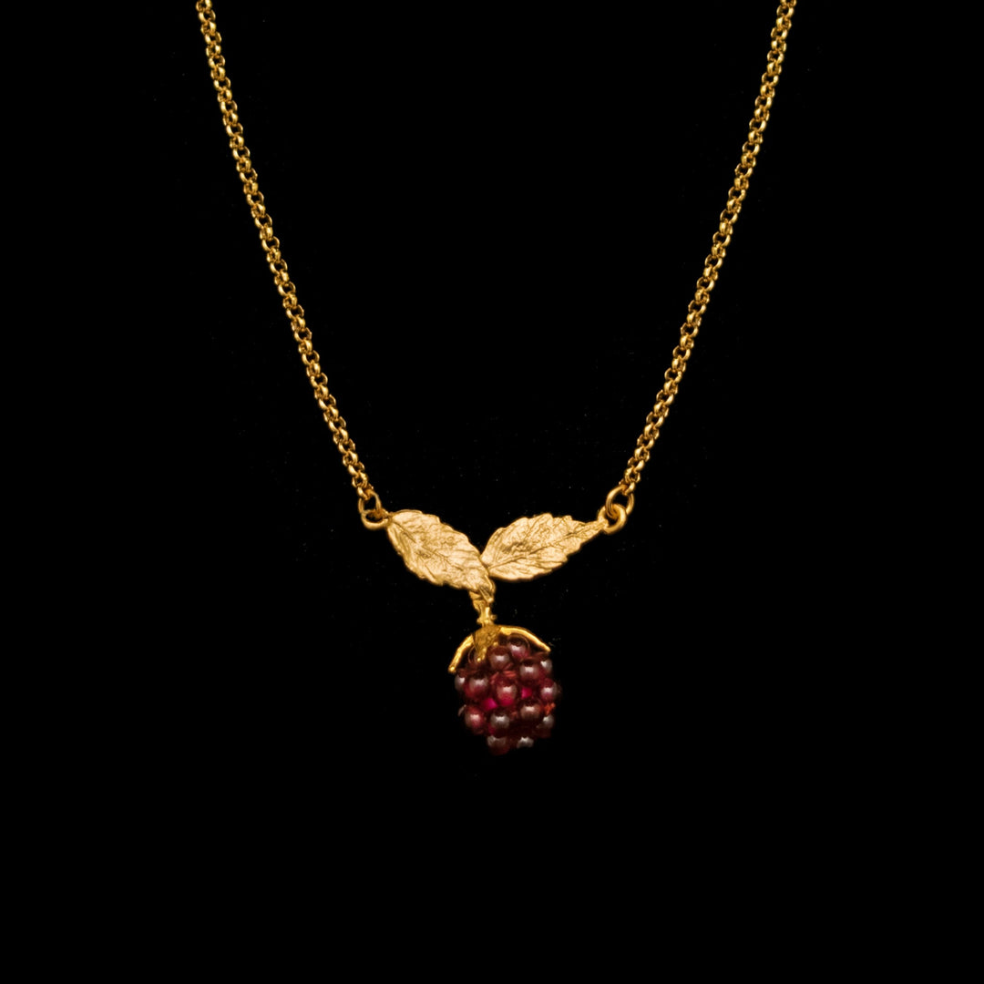 Image of the Michael Michaud Fine Raspberry Pendant on a black background