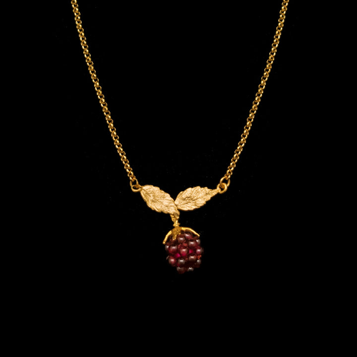 Image of the Michael Michaud Fine Raspberry Pendant on a black background