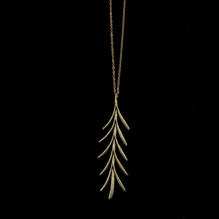 Image of the Michael Michaud Rosemary Pendant on a black background