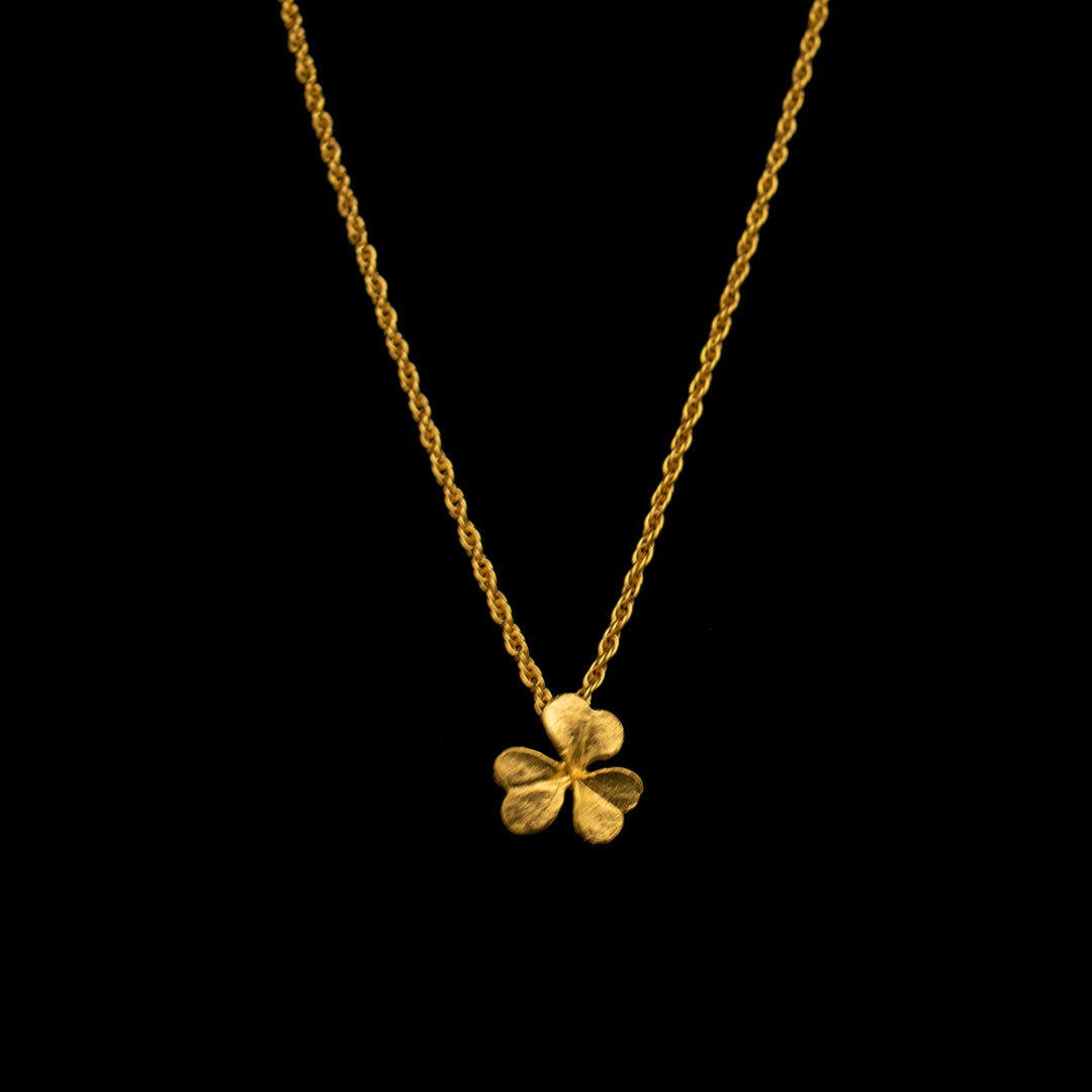 Image of the Michael Michaud Fine Clover Pendant on a black background