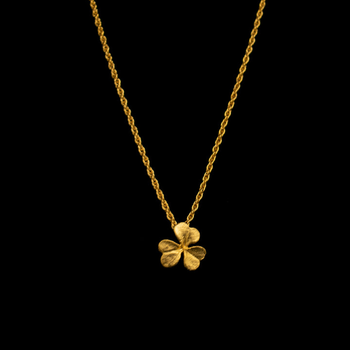 Image of the Michael Michaud Fine Clover Pendant on a black background