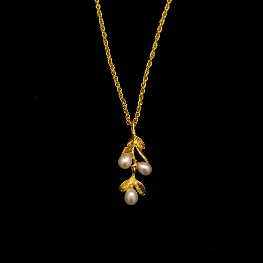 Image of the Michael Michaud Fine Boxwood Petite Pendant on a black background