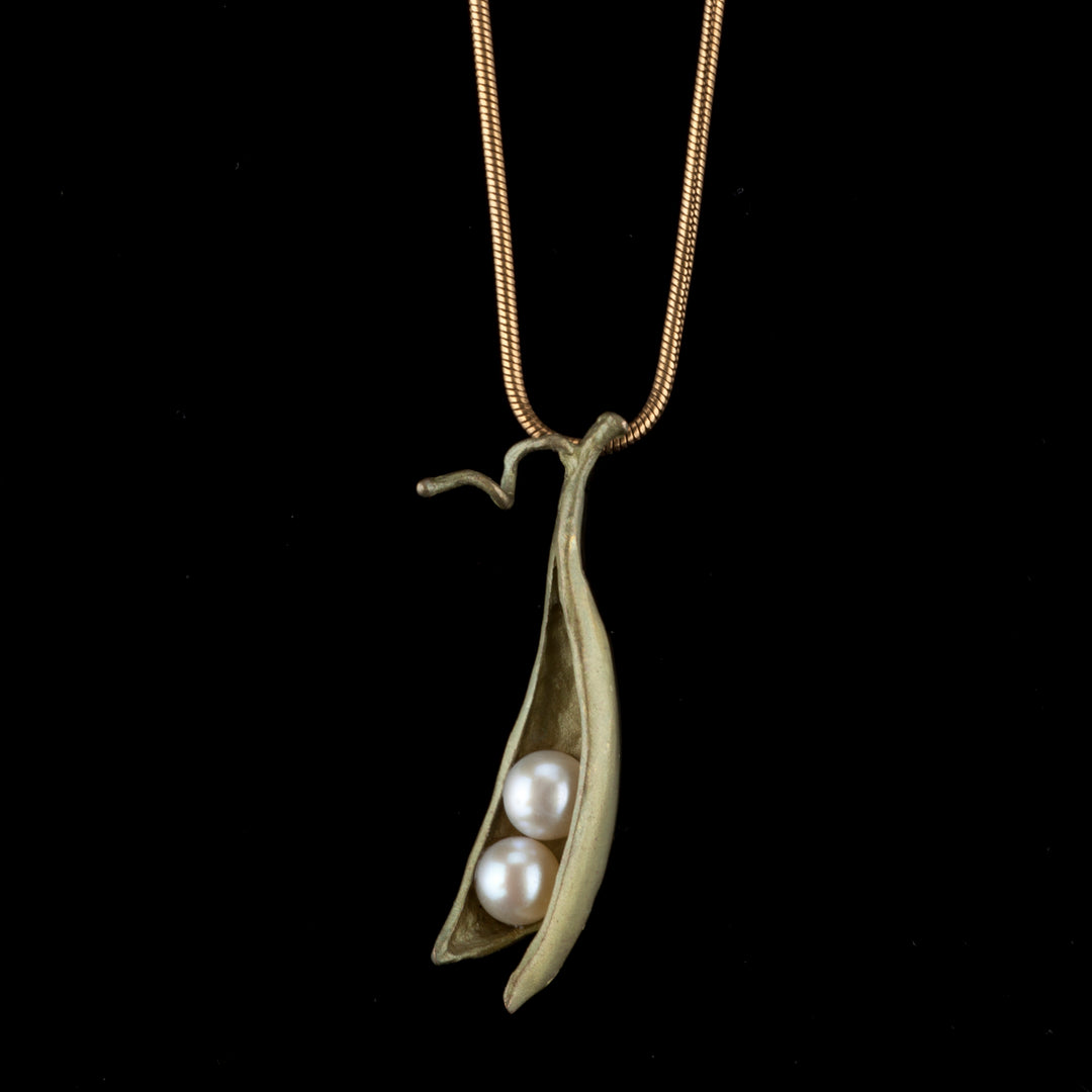 Image of the Michael Michaud Pea Pod Pendant - 2 Pearls on a black background