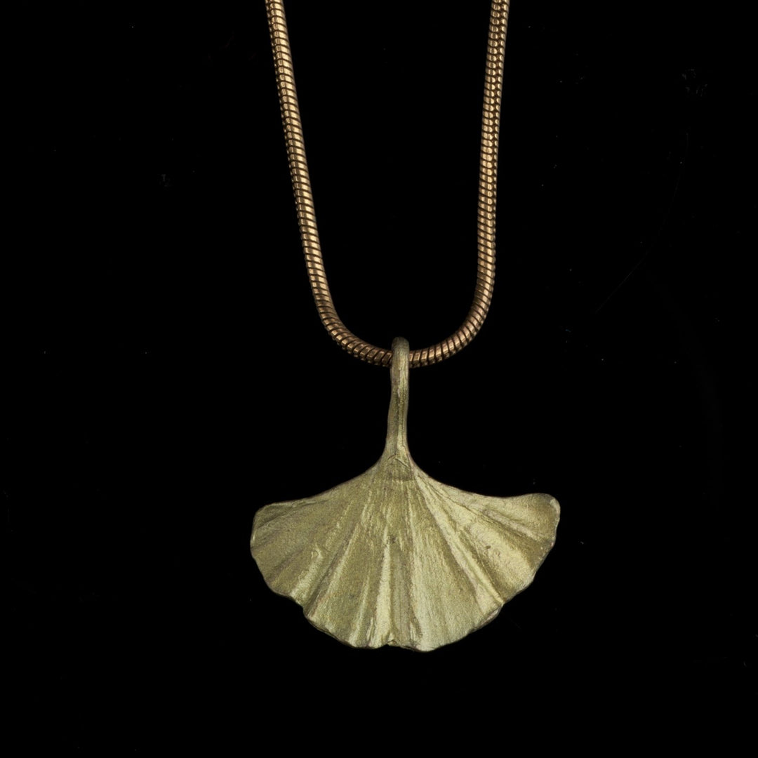 Image of the Michael Michaud Ginkgo Pendant - Single Leaf on a black background