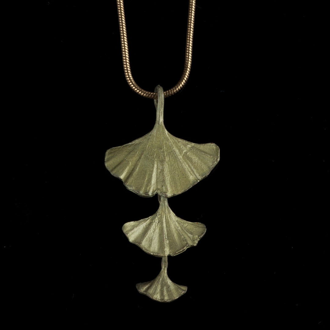 Image of the Michael Michaud Ginkgo Pendant - Triple Leaves on a black background