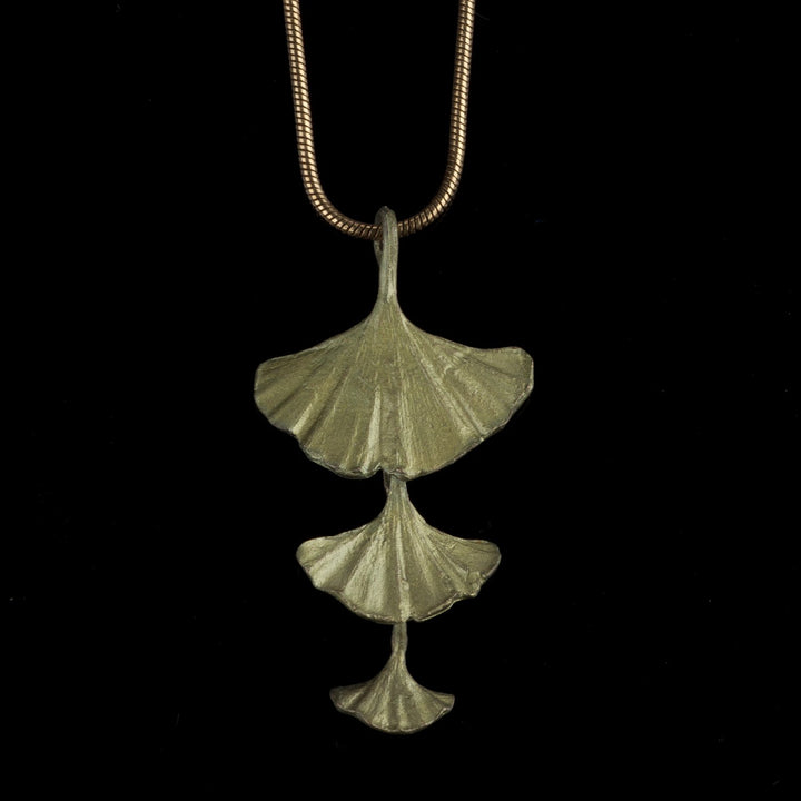 Image of the Michael Michaud Ginkgo Pendant - Triple Leaves on a black background