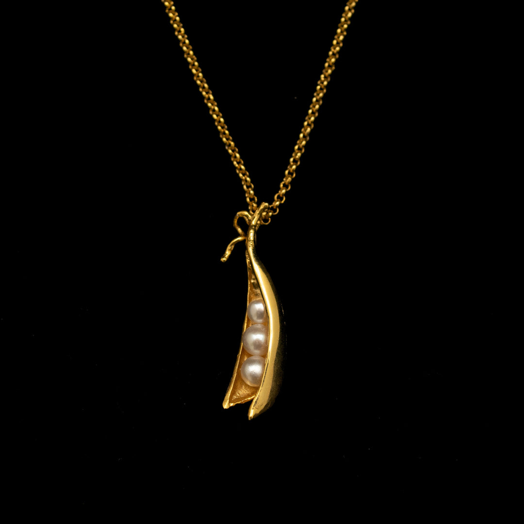 Image of the Michael Michaud Fine Pea Pod 3 Pearls Pendant on a black background