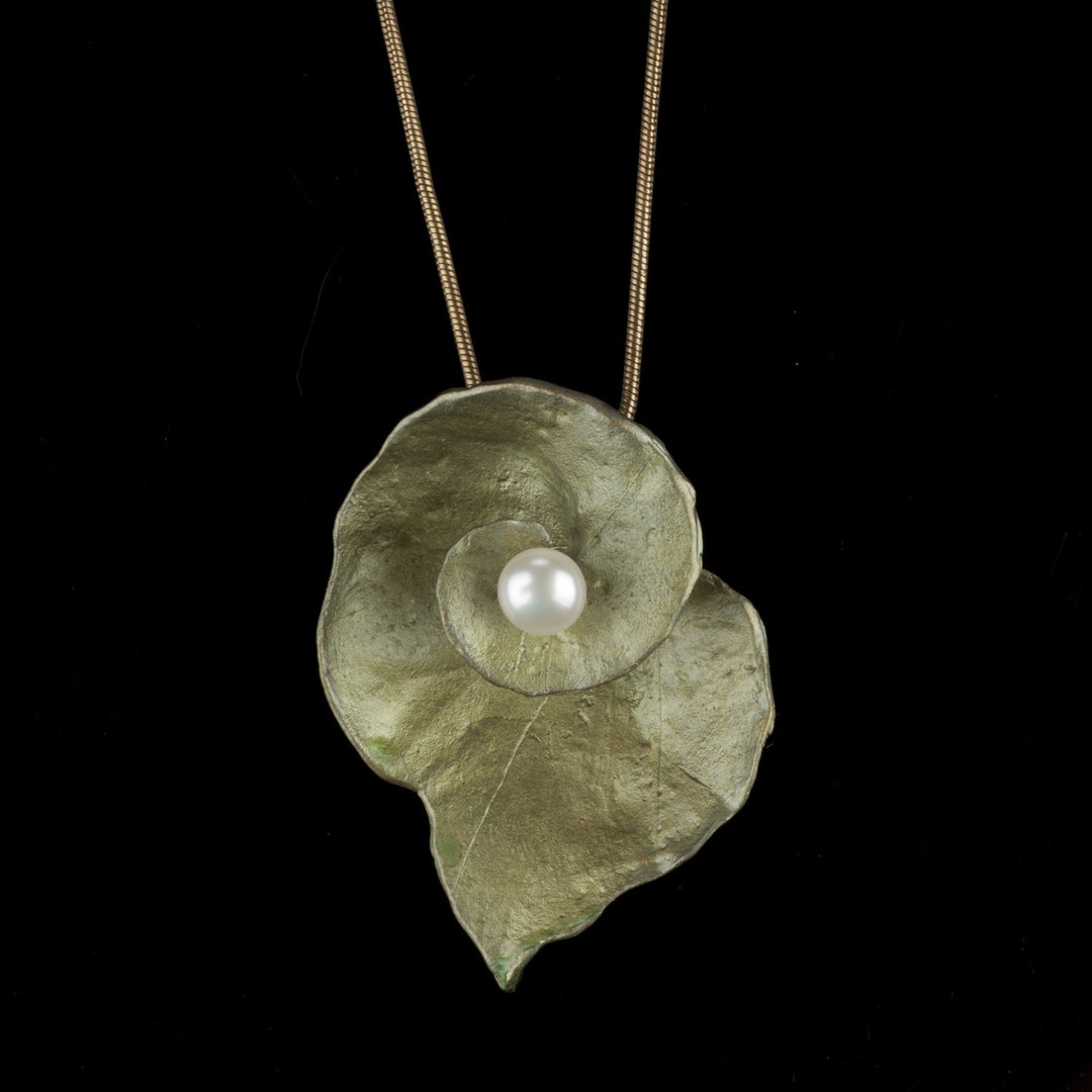 Image of the Michael Michaud Spiral Geranium Long Chain Necklace on a black background