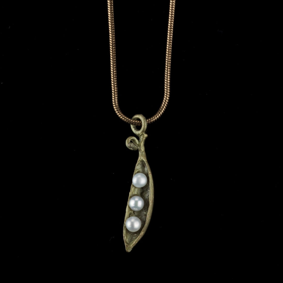 Image of the Michael Michaud Pea Pod Petite Pendant - 3 Pearls on a black background