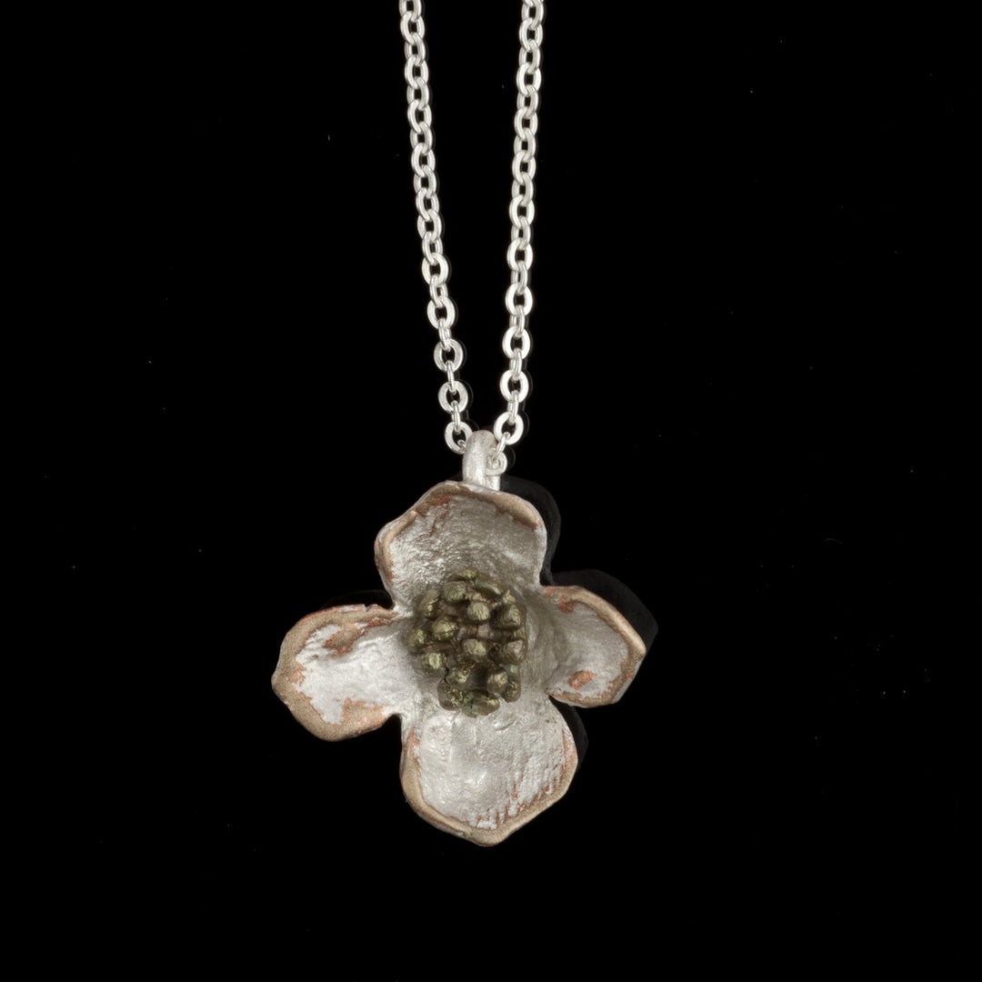 Image of the Michael Michaud Dogwood Pendant on a black background