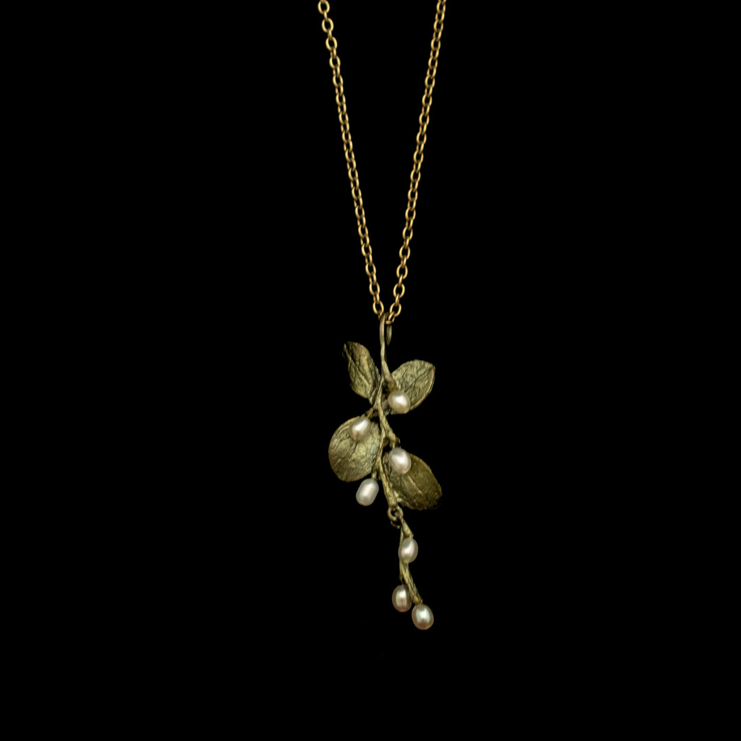 Image of the Michael Michaud Irish Thorn Pendant on a black background