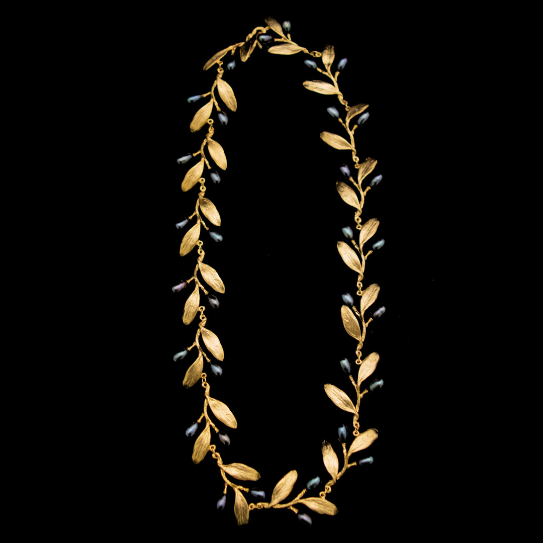 Image of the Michael Michaud Fine Olive Necklace on a black background