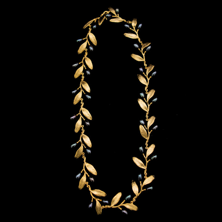 Image of the Michael Michaud Fine Olive Necklace on a black background