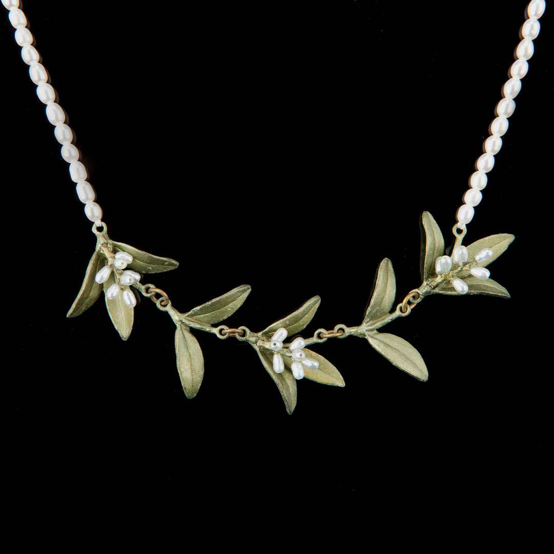 Image of the Michael Michaud Flowering Myrtle Necklace - Pearl Contour on a black background