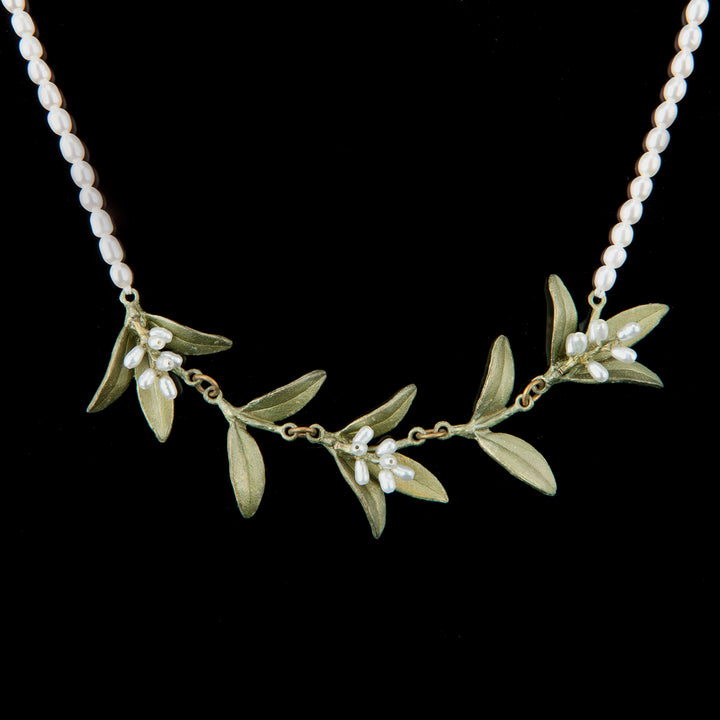 Image of the Michael Michaud Flowering Myrtle Necklace - Pearl Contour on a black background
