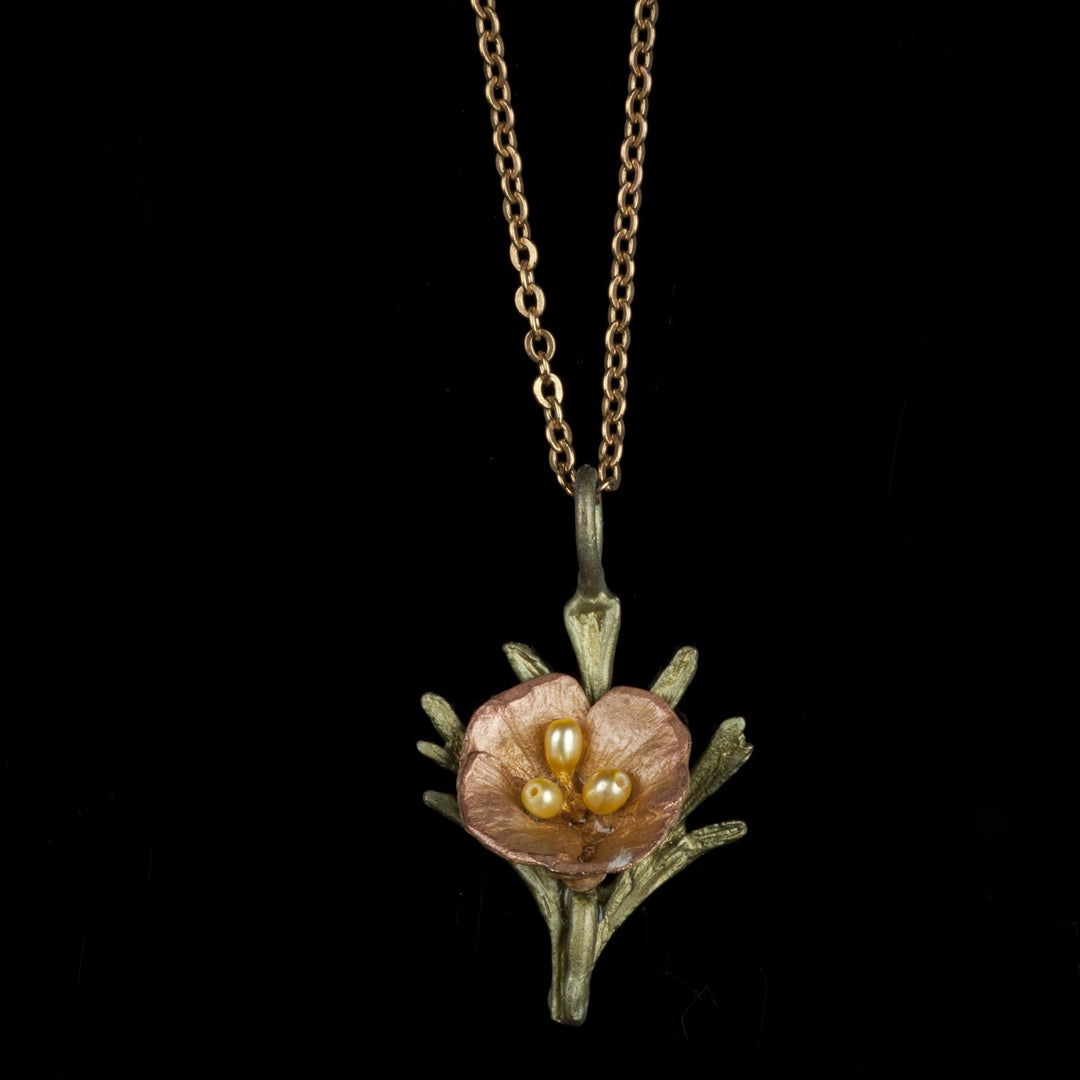 Image of the Michael Michaud California Poppy Pendant - Petite Flower on a black background