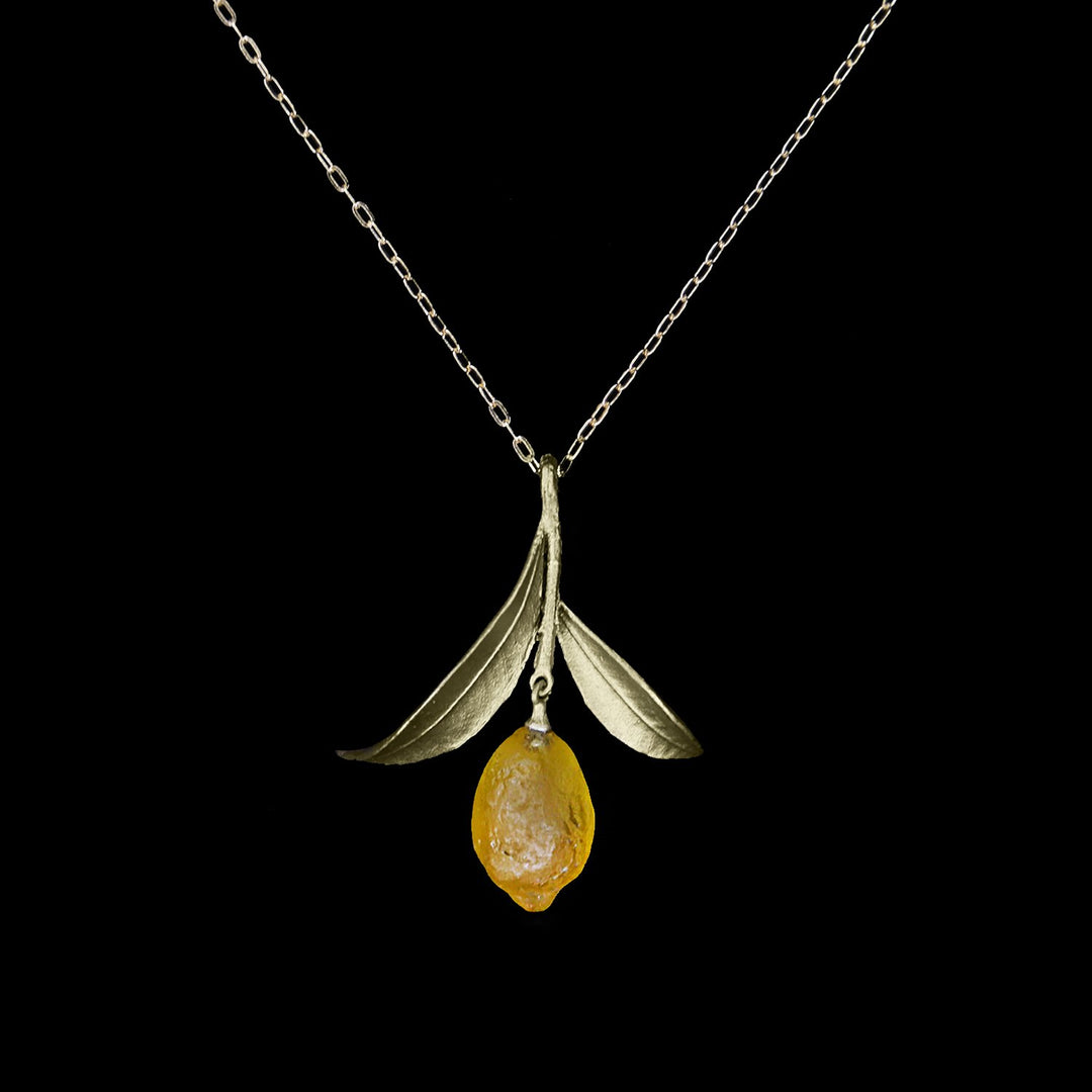 Image of the Michael Michaud Lemon Drop Pendant - Leaf on a black background
