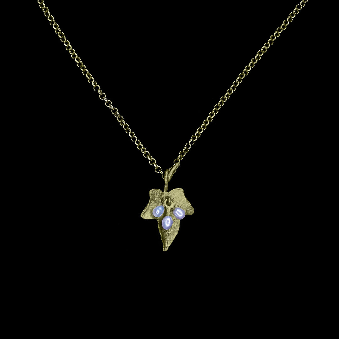 Image of the Michael Michaud Ivy Dainty Pendant on a black background