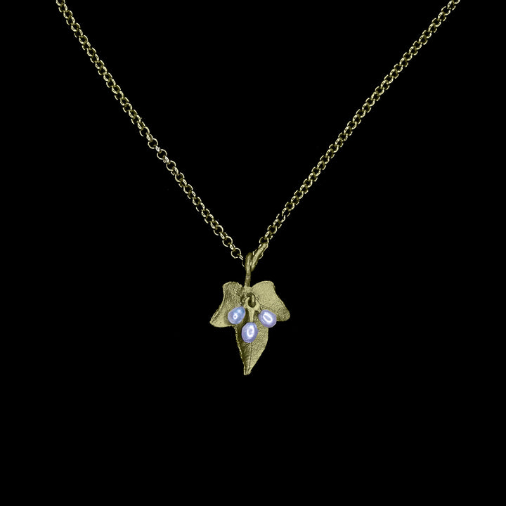 Image of the Michael Michaud Ivy Dainty Pendant on a black background