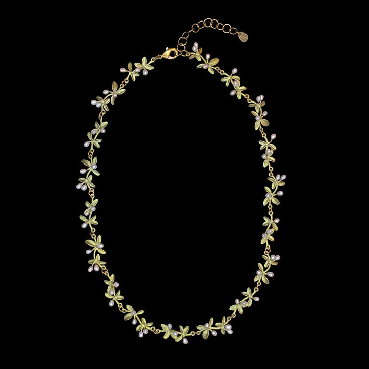 Image of the Michael Michaud Flowering Thyme Necklace on a black background