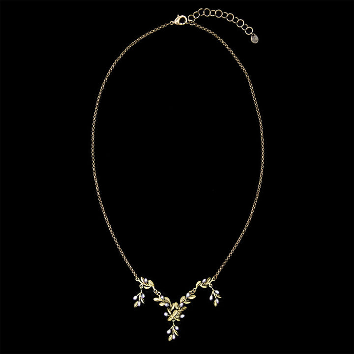 Image of the Michael Michaud Flowering Thyme Necklace - Drop on a black background