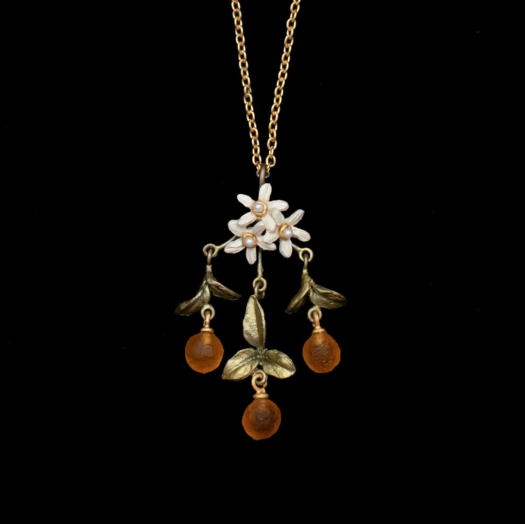 Image of the Michael Michaud Dainty Orange Pendant on a black background