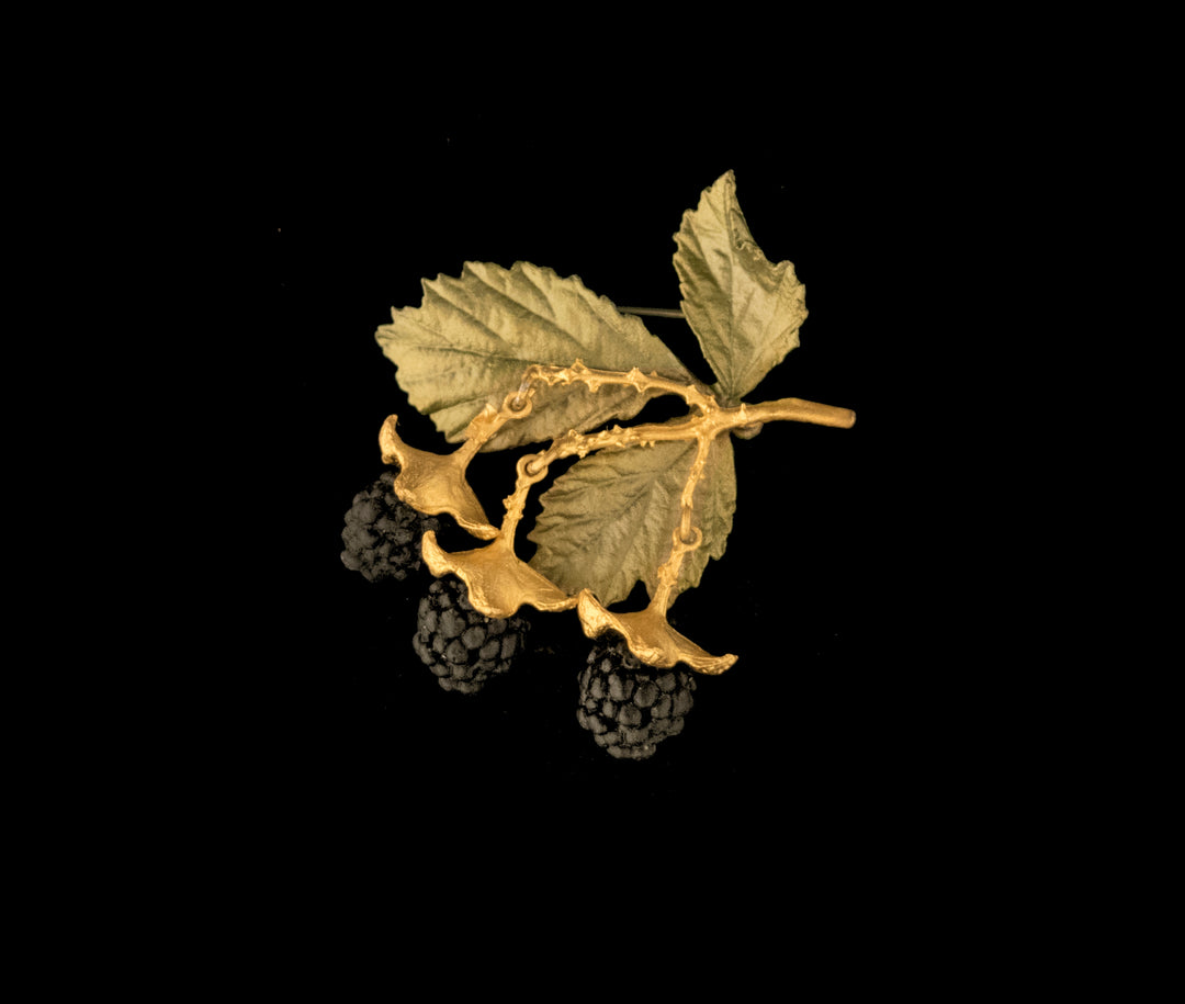 Image of the Michael Michaud Blackberry Brooch on a black background