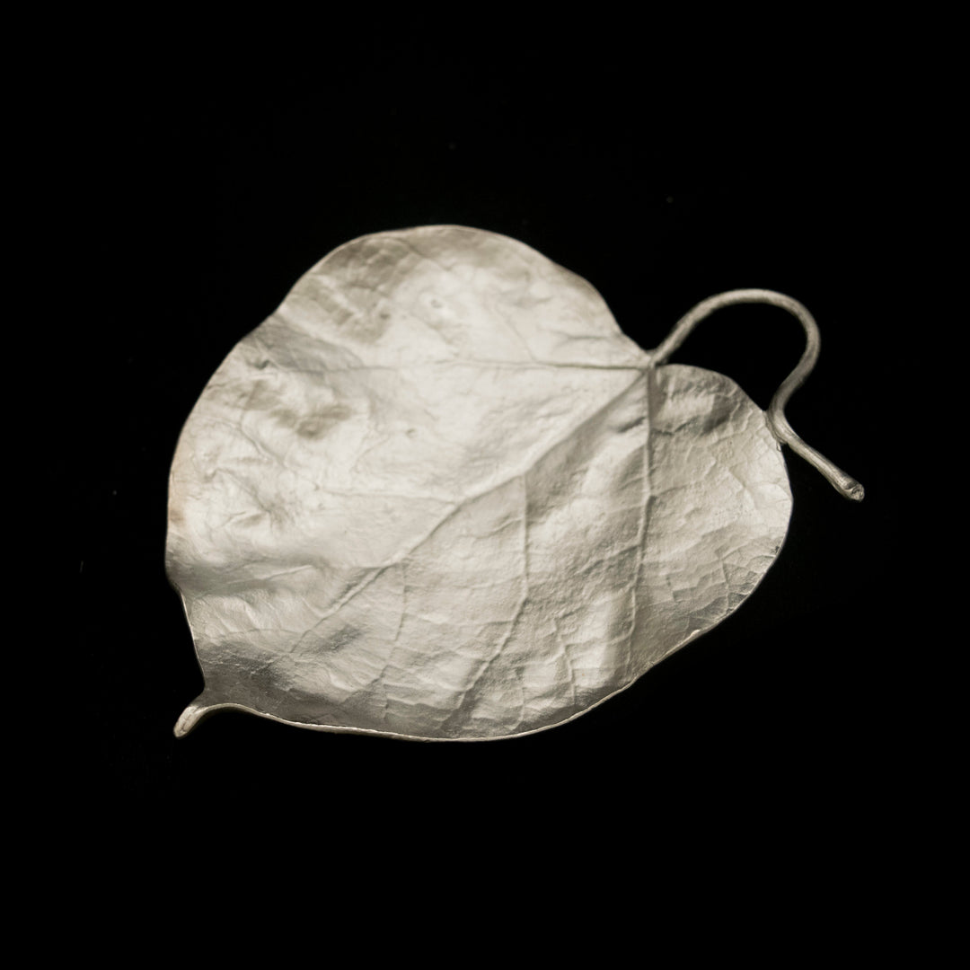 Image of the Michael Michaud Catalpa Leaf Dish - Pewter on a black background