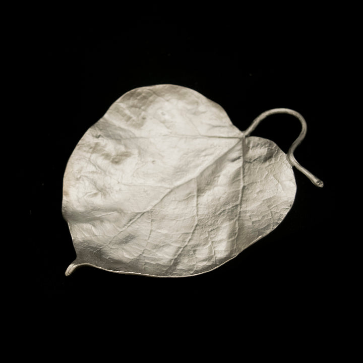 Image of the Michael Michaud Catalpa Leaf Dish - Pewter on a black background