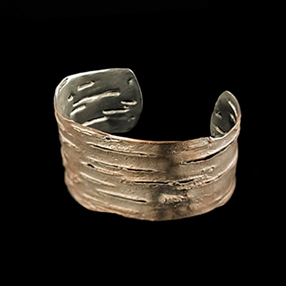 Image of the Michael Michaud Birch Bark Cuff - Silver on a black background