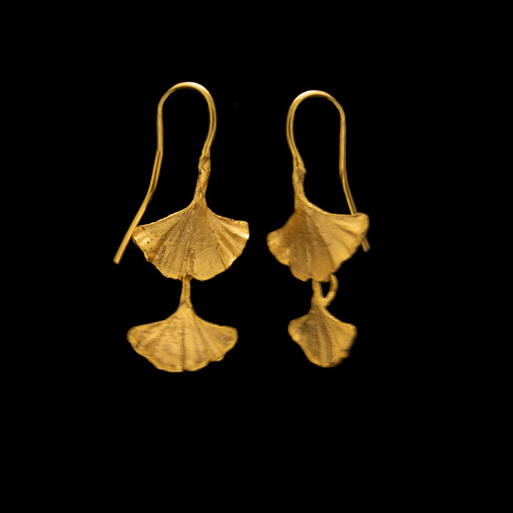 Image of the Michael Michaud Fine Ginkgo Earrings - Double Leaf on a black background