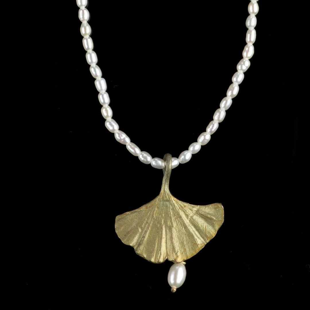 Image of the Michael Michaud Ginkgo Pendant - Pearl Drop on a black background