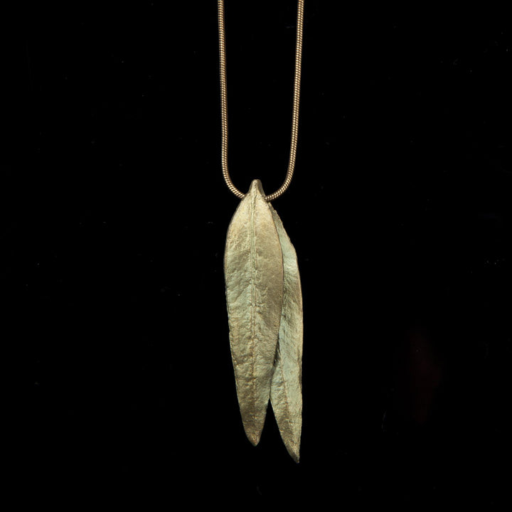 Image of the Michael Michaud Eucalyptus Long Double Leaf Pendant on a black background
