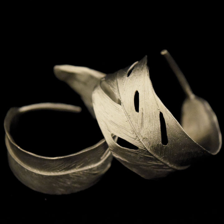 Image of the Michael Michaud Feather Napkin Rings on a black background