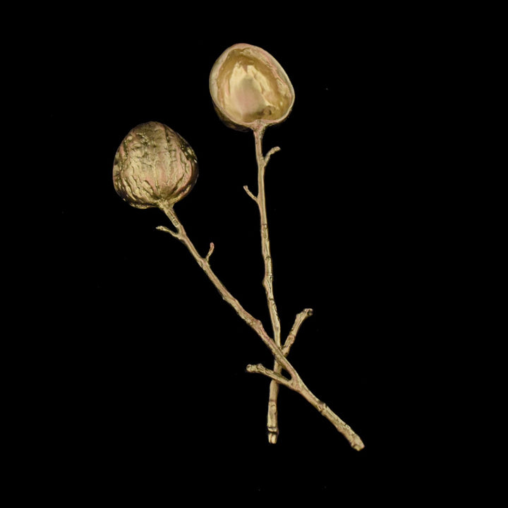 Image of the Michael Michaud Walnut Bronze Spoons on a black background