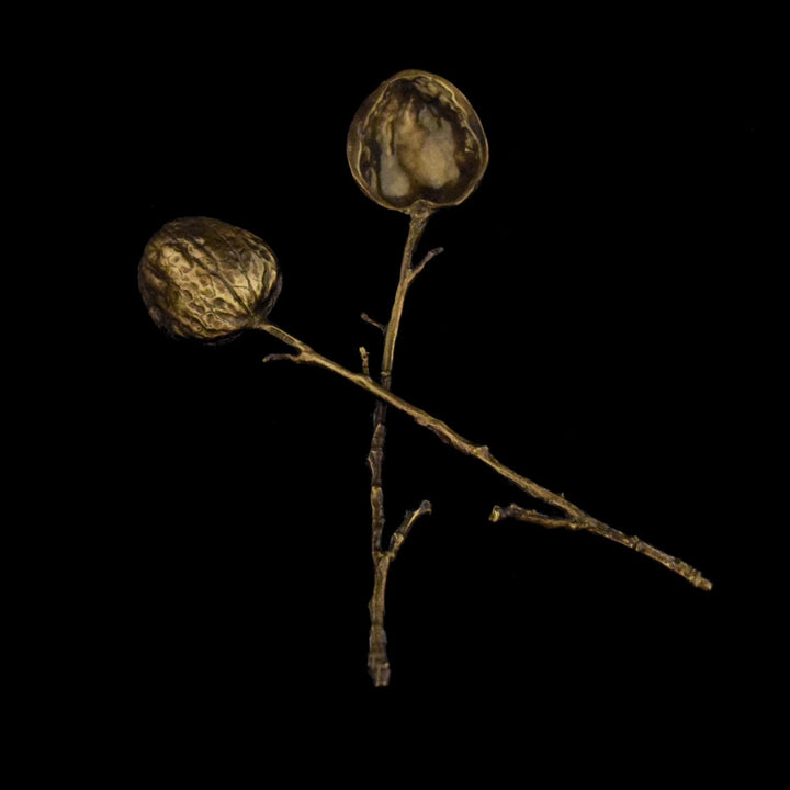 Image of the Michael Michaud Walnut Antiqued Spoons on a black background