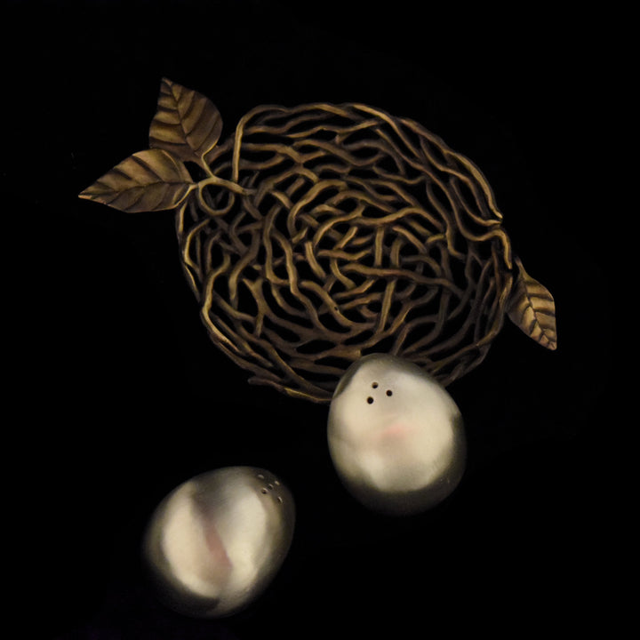 Image of the Michael Michaud Bird's Nest with Eggs - Salt and Pepper Servers on a black background