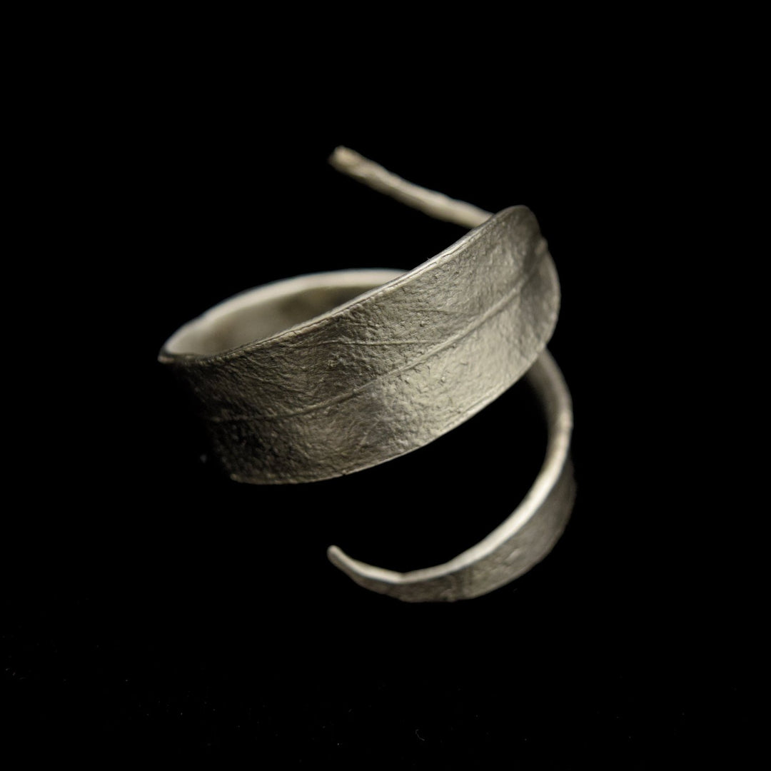 Image of the Michael Michaud Eucalyptus Napkin Rings -Pewter on a black background