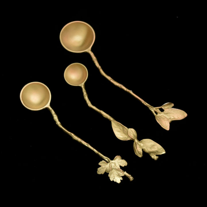 Image of the Michael Michaud Herb Nesting Spoons -Bronze on a black background