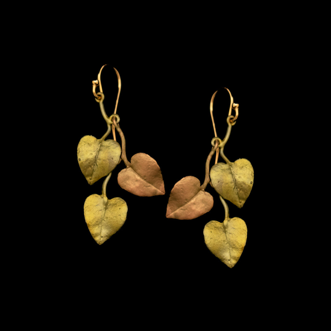 Image of the Michael Michaud Sweet Potato Vine Earrings - Dangle on a black background