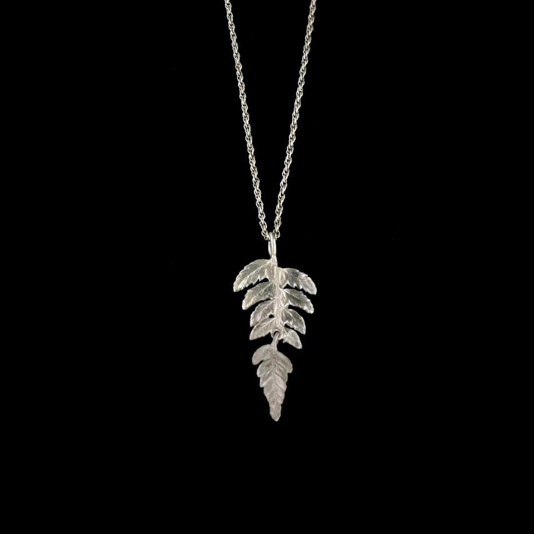 Image of the Michael Michaud Fine Fern Silver Dainty Pendant on a black background