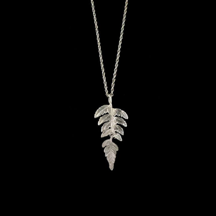 Image of the Michael Michaud Fine Fern Silver Dainty Pendant on a black background