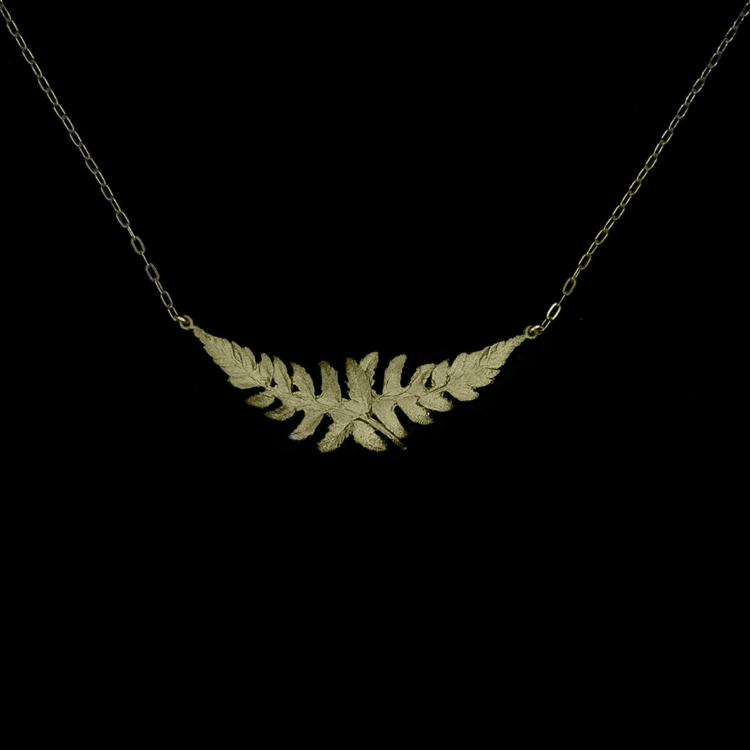 Image of the Michael Michaud Dainty Fern Pendant on a black background
