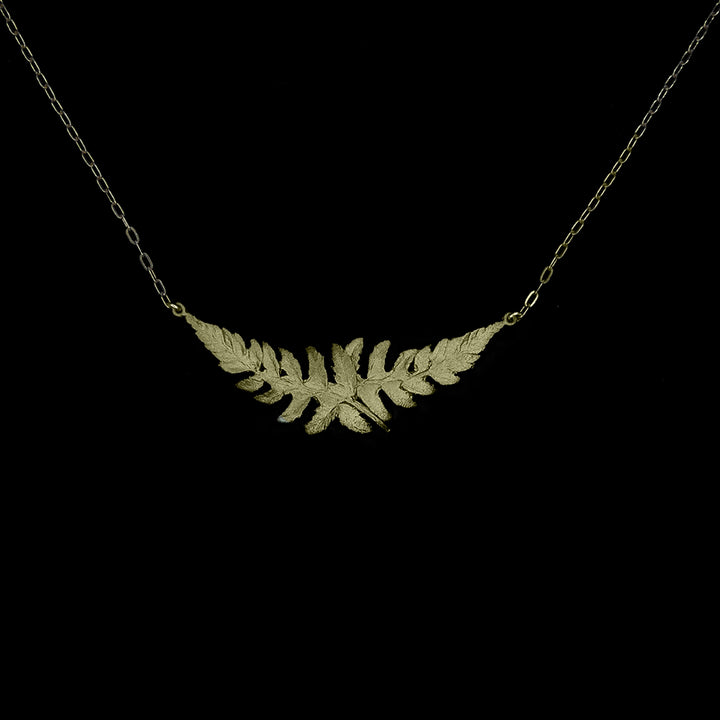 Image of the Michael Michaud Dainty Fern Pendant on a black background
