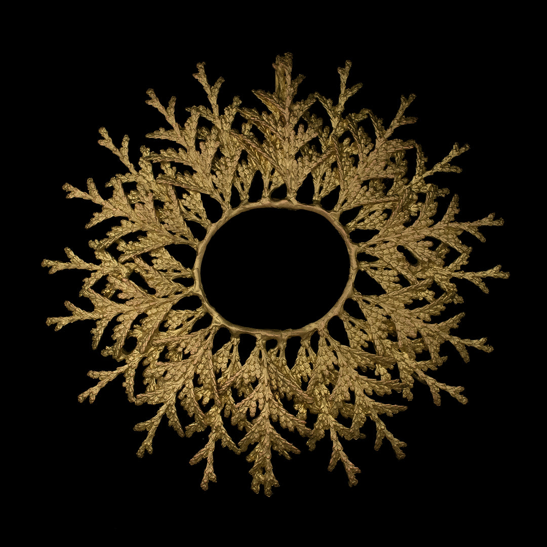 Image of the Michael Michaud Holiday Arbor Trivet on a black background